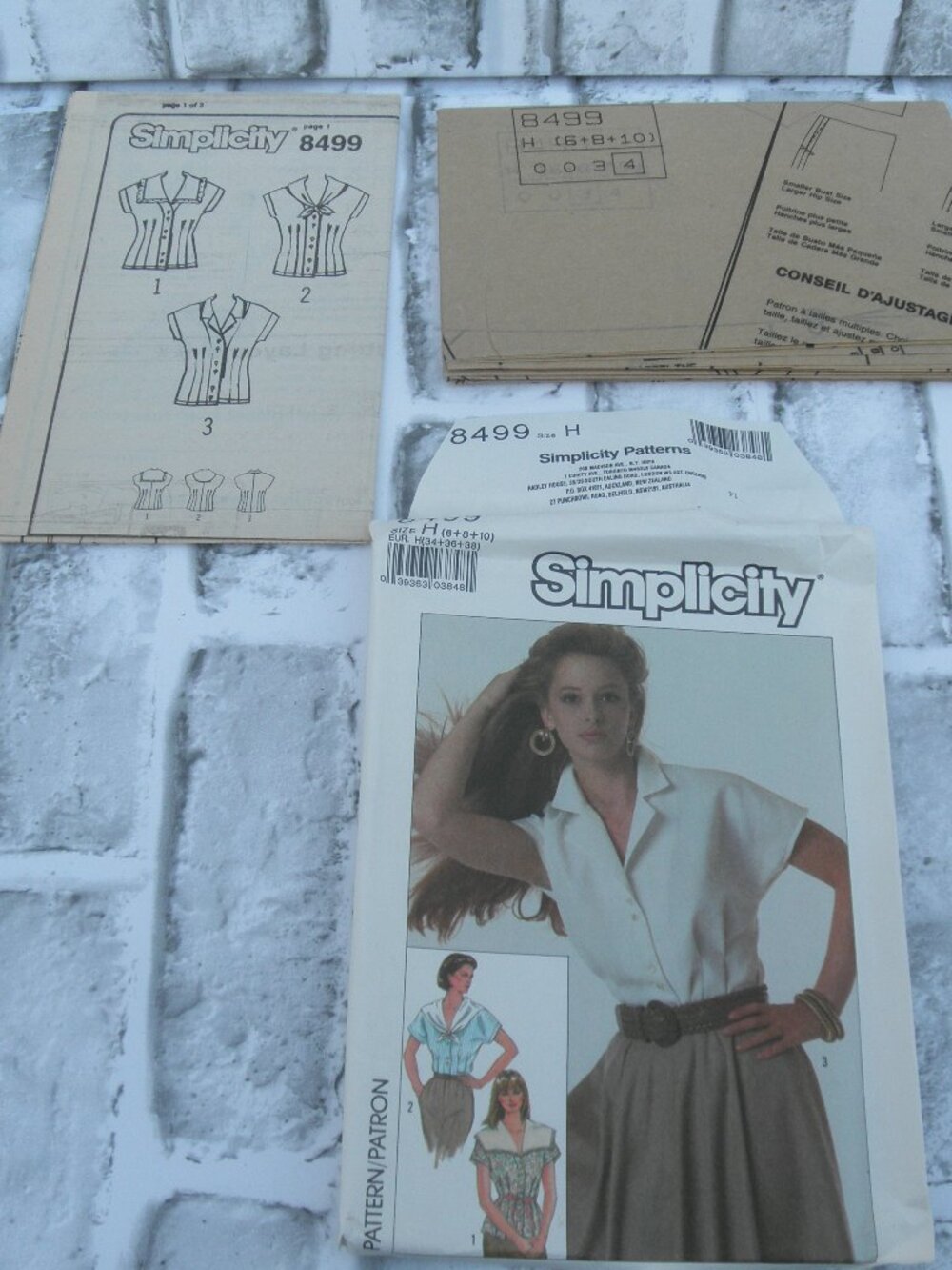 # 8499 SIMPLICITY UNCUT SEWING PATTERN MISSES BLOUSES (SIZE 6-8-10) (10PCS)